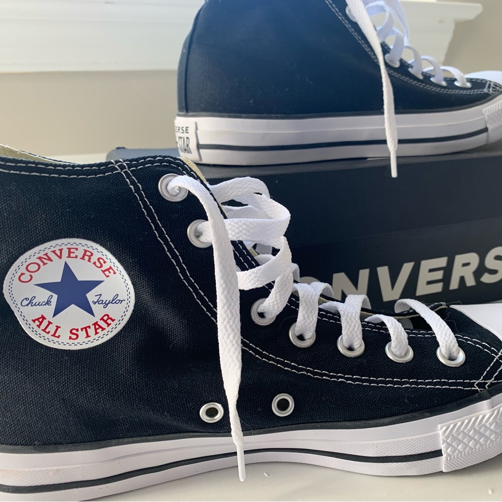 New, never worn, black converse high top sneakers.